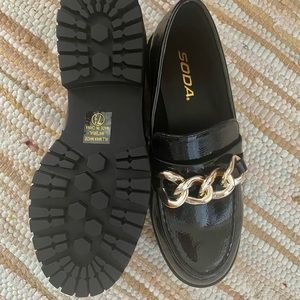 Black faux letter chunky loafers